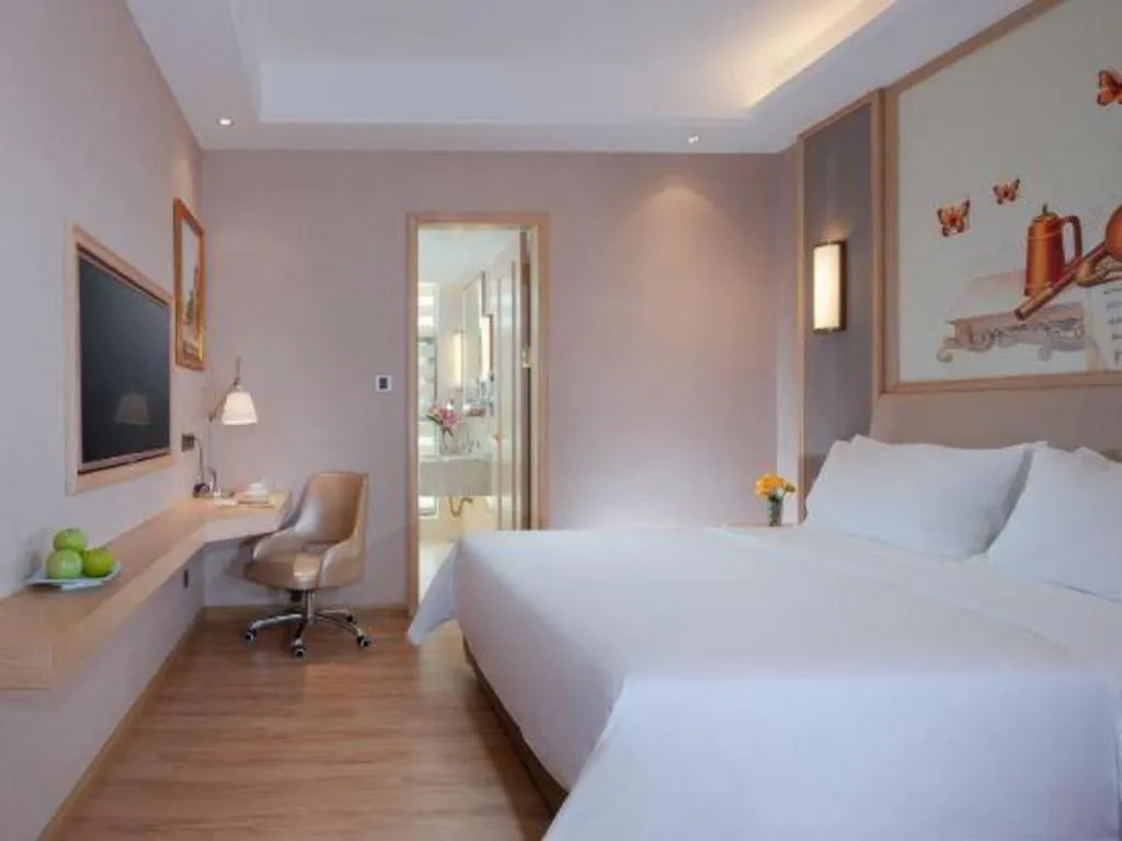 Bed in Vienna Hotel Guangdong Zhaoqing East Station Dinghu Mountain Scenic Area