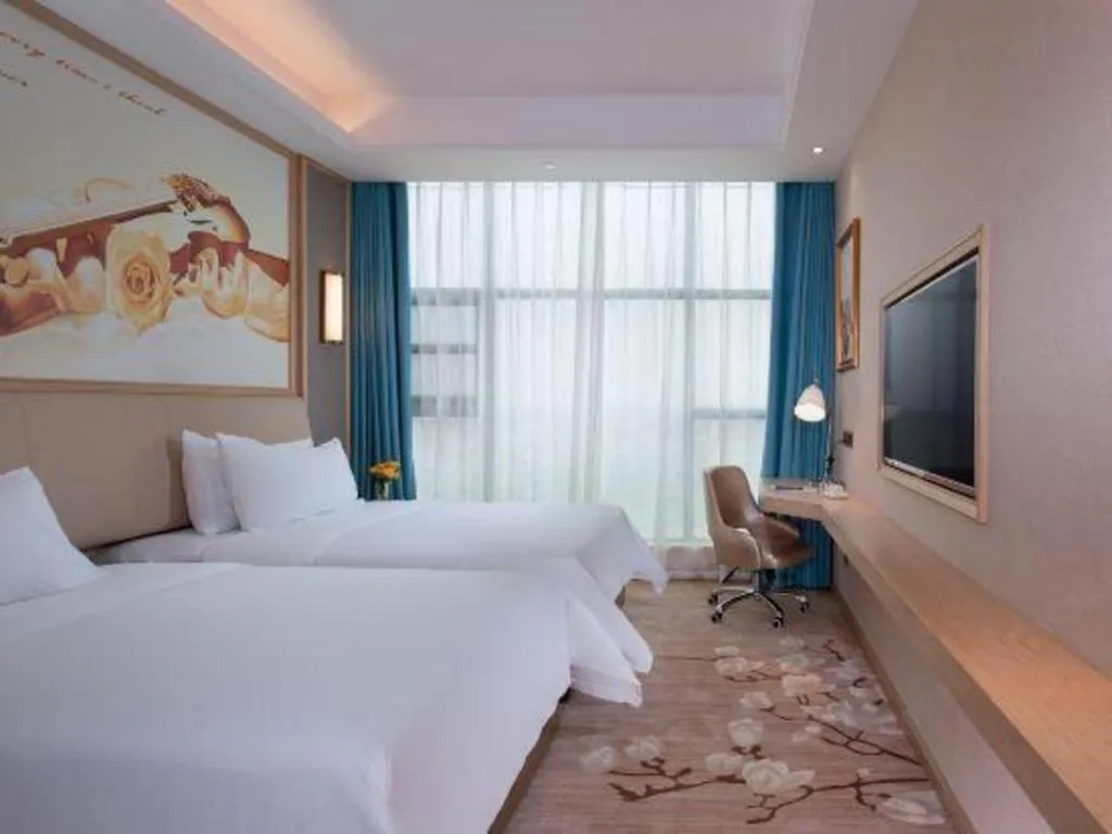 Bed in Vienna Hotel Guangdong Zhaoqing East Station Dinghu Mountain Scenic Area