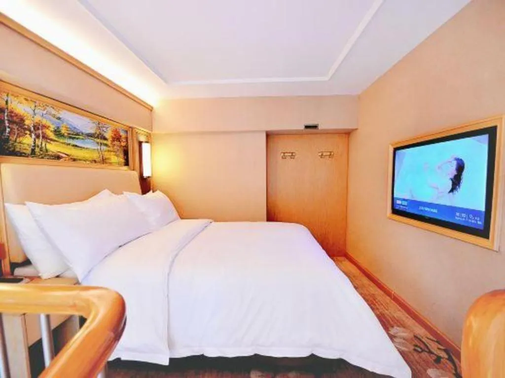Bed in Vienna Hotel Guangdong Zhaoqing East Station Dinghu Mountain Scenic Area