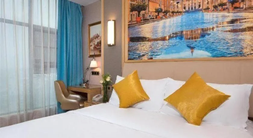 Bed in Vienna Hotel Guangdong Zhaoqing East Station Dinghu Mountain Scenic Area