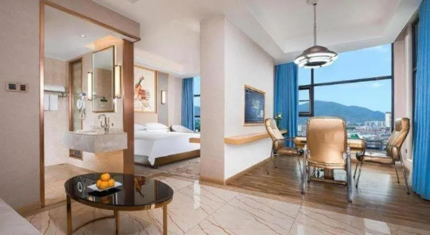 Bed in Vienna Hotel Guangdong Zhaoqing East Station Dinghu Mountain Scenic Area