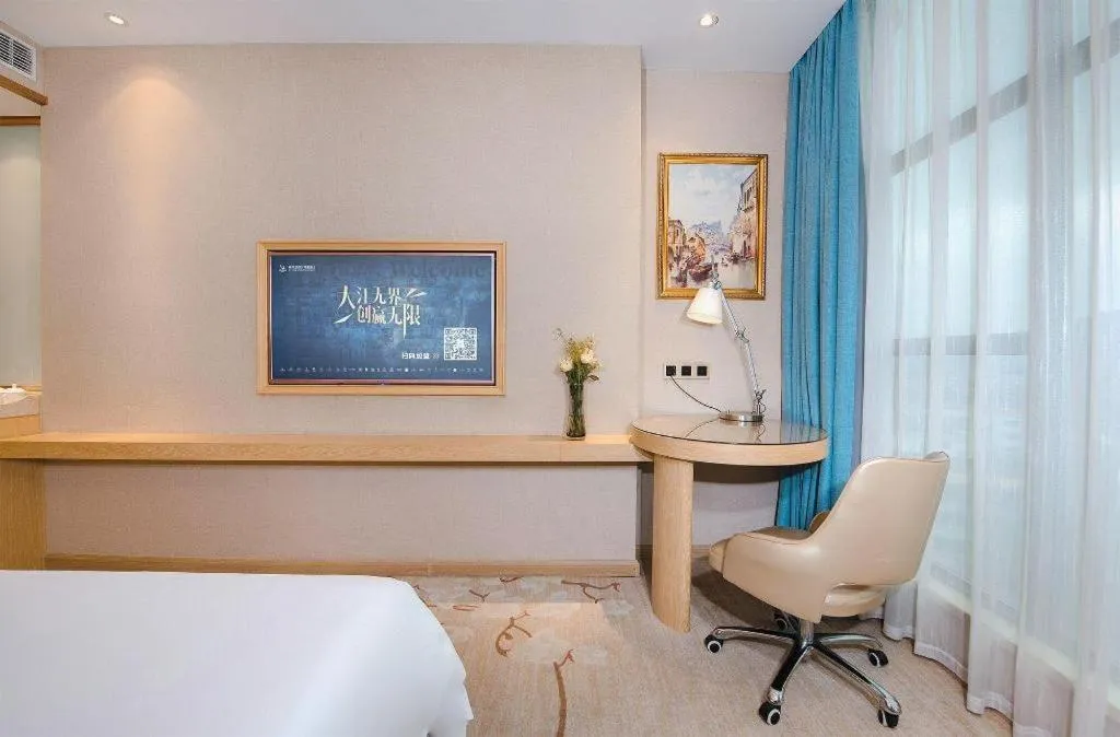 Bed in Vienna Hotel Guangdong Zhaoqing East Station Dinghu Mountain Scenic Area