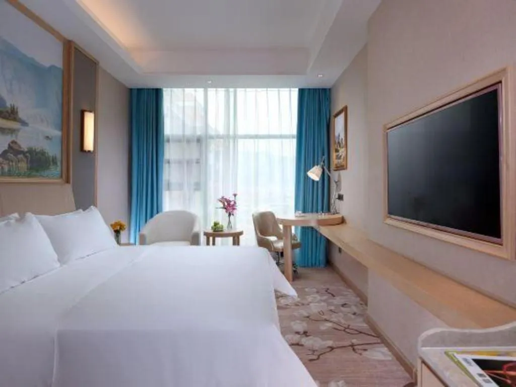 Bed in Vienna Hotel Guangdong Zhaoqing East Station Dinghu Mountain Scenic Area