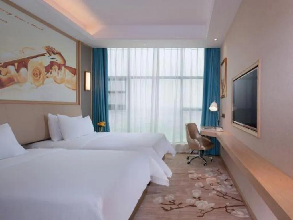 Bed in Vienna Hotel Guangdong Zhaoqing East Station Dinghu Mountain Scenic Area
