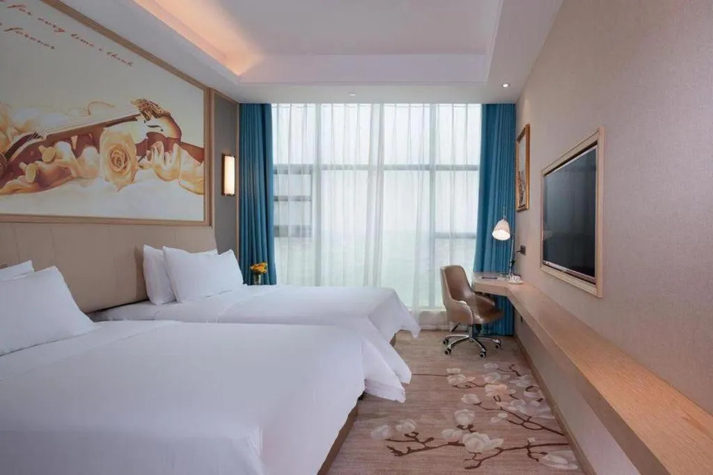 Bed in Vienna Hotel Guangdong Zhaoqing East Station Dinghu Mountain Scenic Area