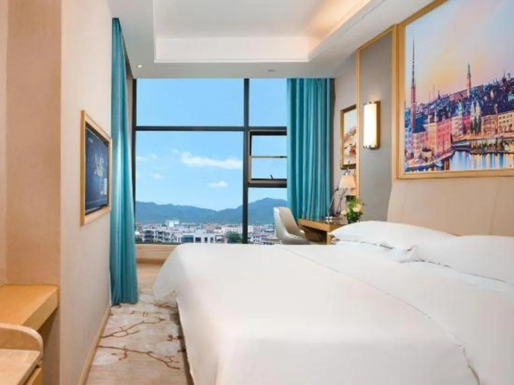 Bed in Vienna Hotel Guangdong Zhaoqing East Station Dinghu Mountain Scenic Area