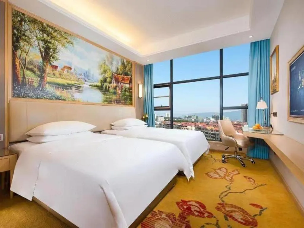 Bed in Vienna Hotel Guangdong Zhaoqing East Station Dinghu Mountain Scenic Area