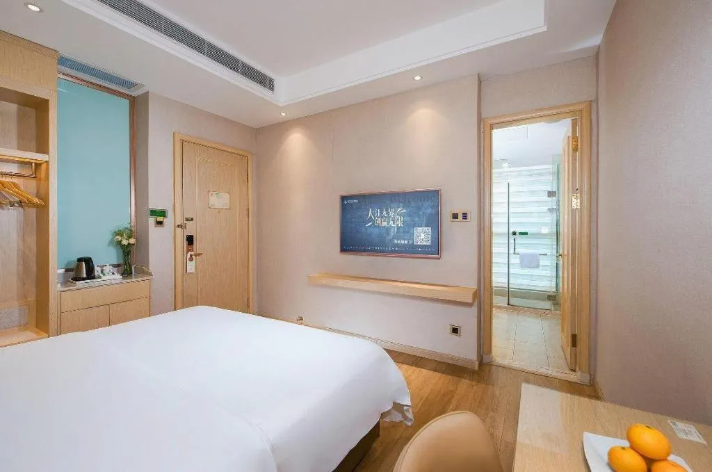Bed in Vienna Hotel Guangdong Zhaoqing East Station Dinghu Mountain Scenic Area