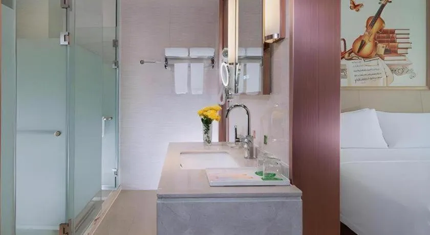 Bed in Vienna Hotel Guangdong Zhaoqing East Station Dinghu Mountain Scenic Area