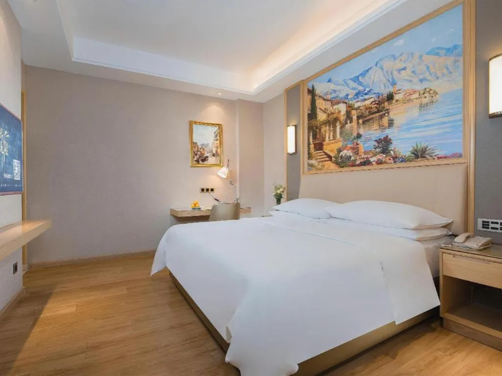 Bed in Vienna Hotel Guangdong Zhaoqing East Station Dinghu Mountain Scenic Area