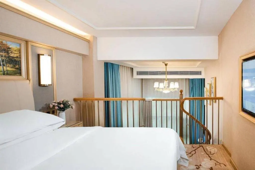 Bed in Vienna Hotel Guangdong Zhaoqing East Station Dinghu Mountain Scenic Area
