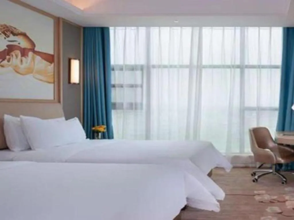 Bed in Vienna Hotel Guangdong Zhaoqing East Station Dinghu Mountain Scenic Area