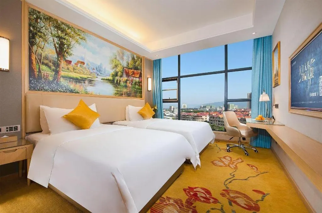 Bed in Vienna Hotel Guangdong Zhaoqing East Station Dinghu Mountain Scenic Area