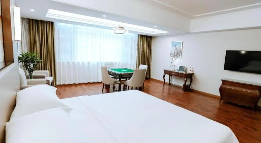 Bed in Vienna Hotel Jiangxi Fuzhou Lichuan Kangshu