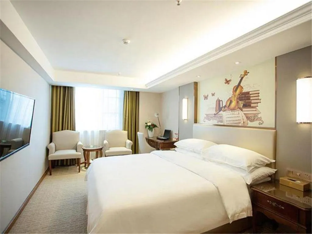 Bed in Vienna Hotel Jiangxi Fuzhou Lichuan Kangshu