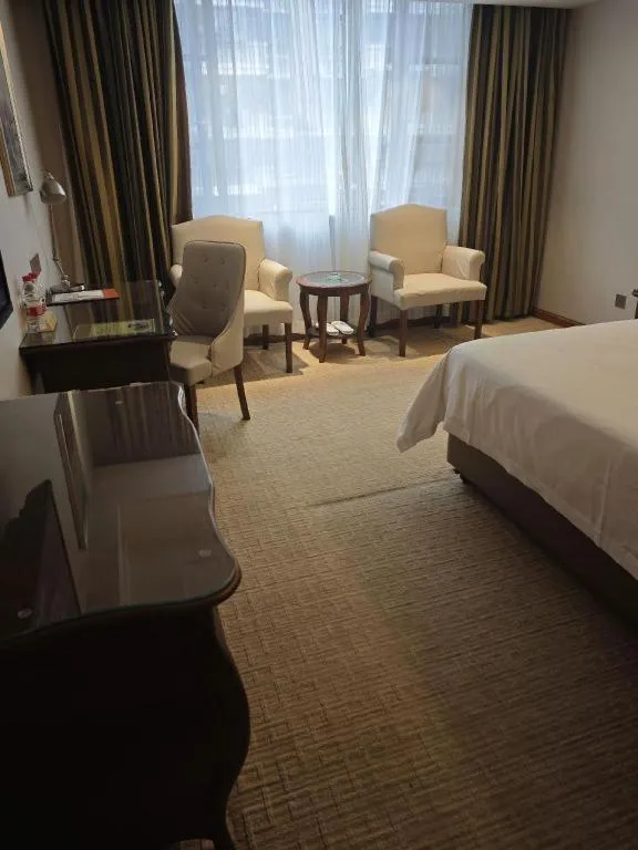 Bed in Vienna Hotel Jiangxi Fuzhou Lichuan Kangshu