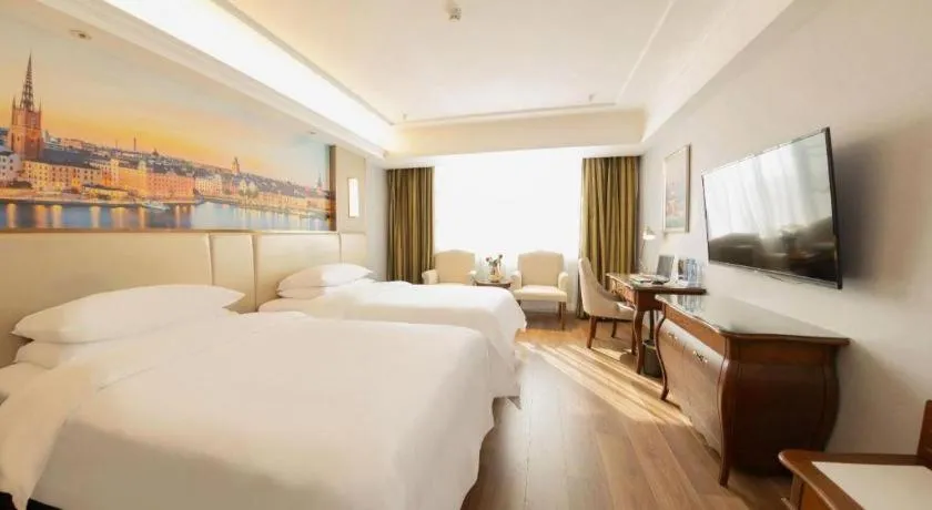 Bed in Vienna Hotel Jiangxi Fuzhou Lichuan Kangshu