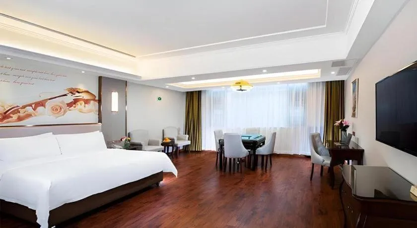 Bed in Vienna Hotel Jiangxi Fuzhou Lichuan Kangshu