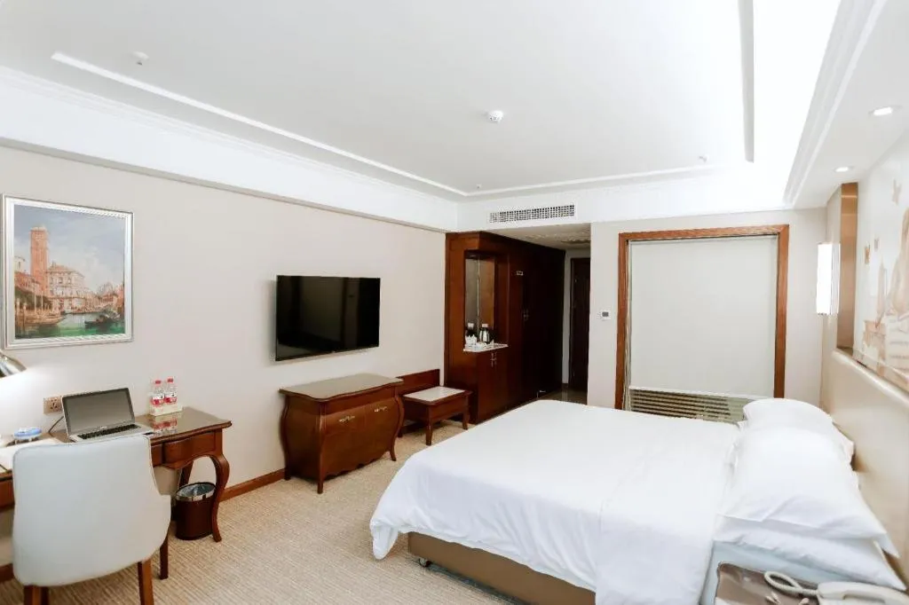 Bed in Vienna Hotel Jiangxi Fuzhou Lichuan Kangshu