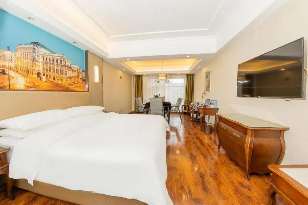 Bed in Vienna Hotel Jiangxi Fuzhou Lichuan Kangshu