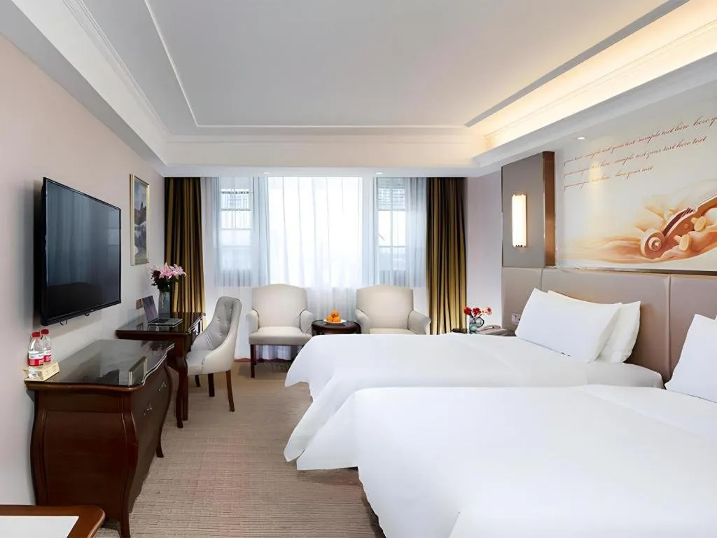 Bed in Vienna Hotel Jiangxi Fuzhou Lichuan Kangshu