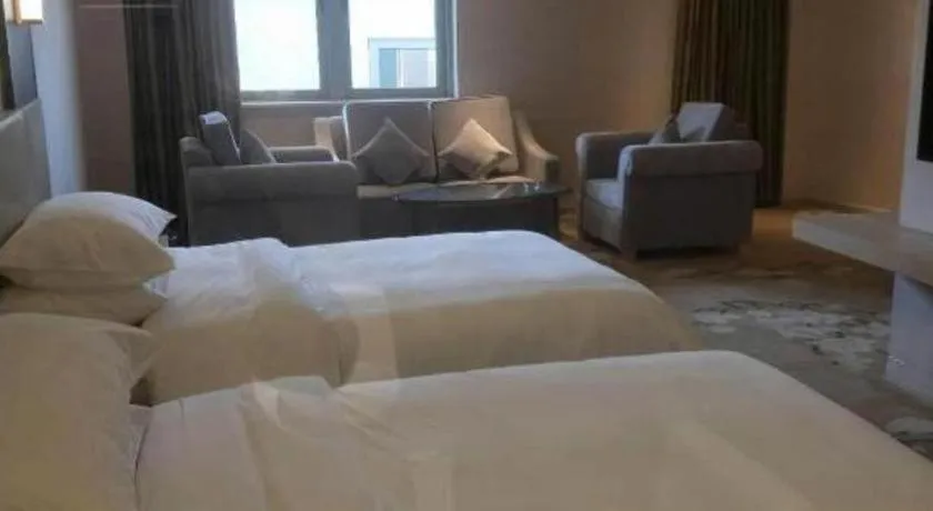 Bed in Vienna Hotel Yunnan Lijiang Ancient City