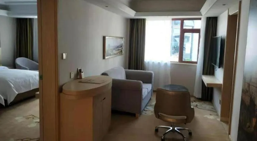 Bed in Vienna Hotel Yunnan Lijiang Ancient City