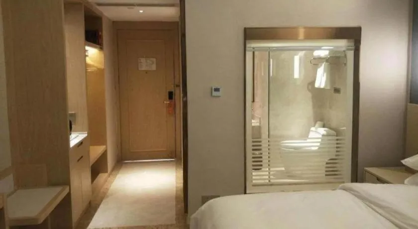 Bed in Vienna Hotel Yunnan Lijiang Ancient City