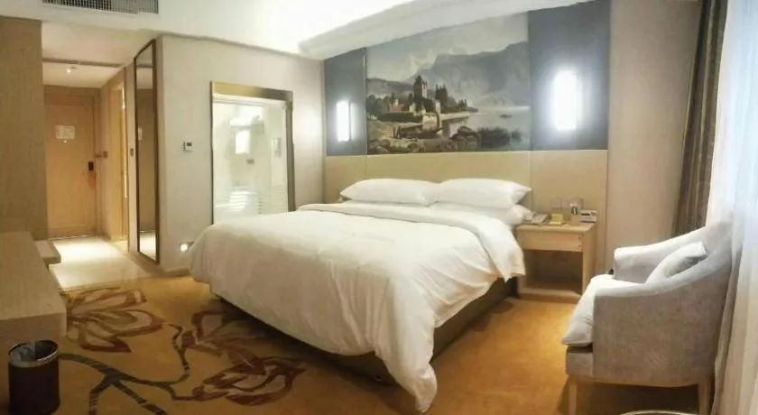 Bed in Vienna Hotel Yunnan Lijiang Ancient City