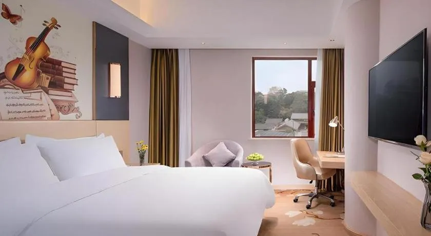 Bed in Vienna Hotel Yunnan Lijiang Ancient City