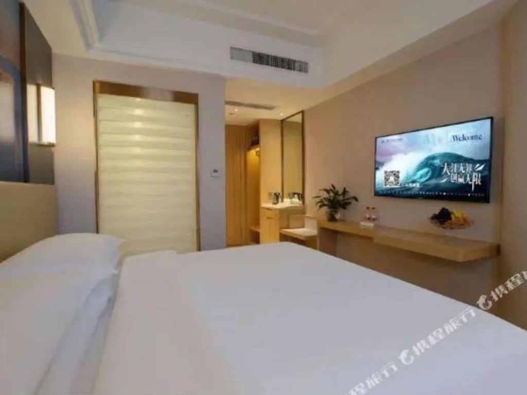 Bed in Vienna Hotel Yunnan Lijiang Ancient City