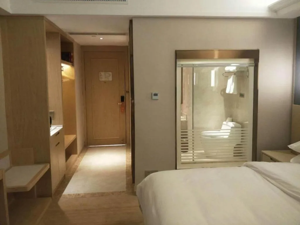 Bed in Vienna Hotel Yunnan Lijiang Ancient City