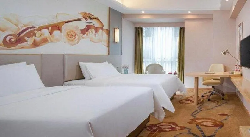 Bed in Vienna Hotel Yunnan Lijiang Ancient City