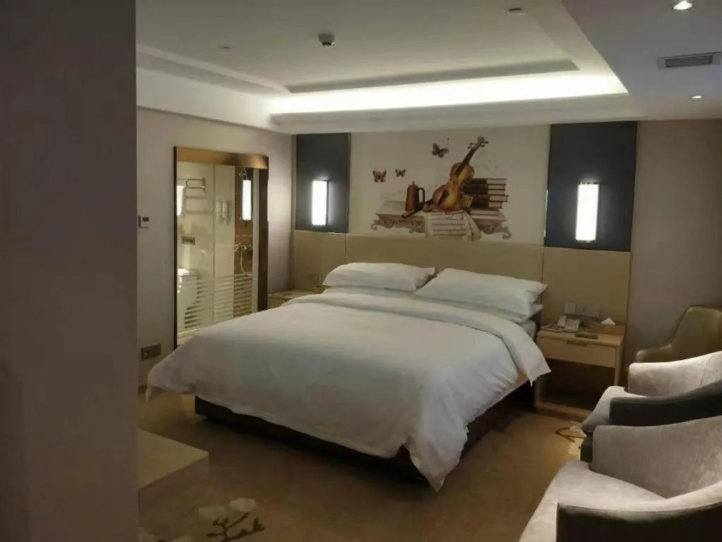 Bed in Vienna Hotel Yunnan Lijiang Ancient City