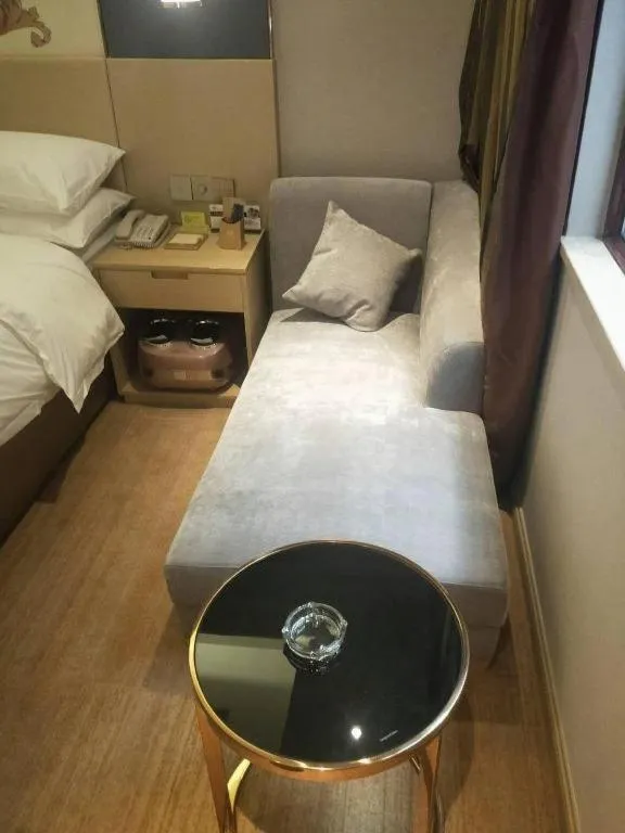 Bed in Vienna Hotel Yunnan Lijiang Ancient City