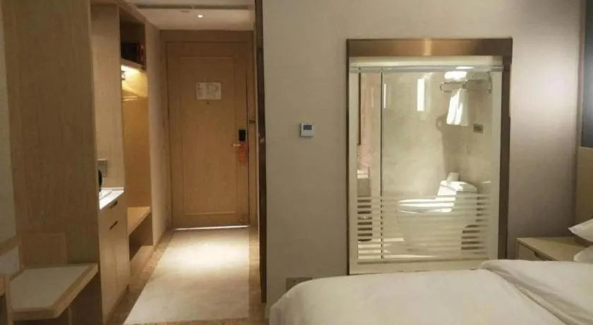 Bed in Vienna Hotel Yunnan Lijiang Ancient City