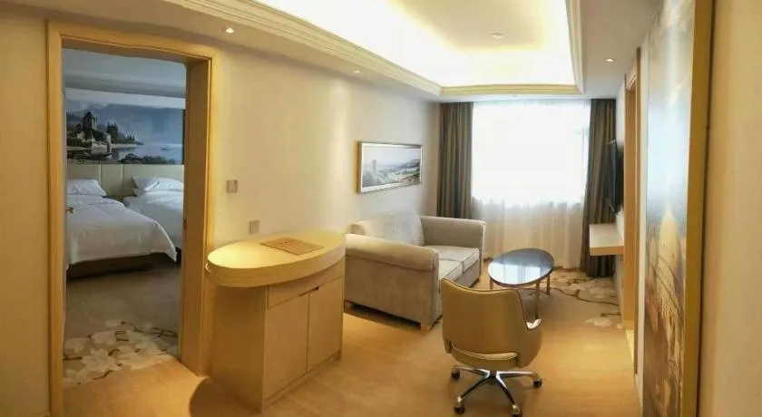 Bed in Vienna Hotel Yunnan Lijiang Ancient City