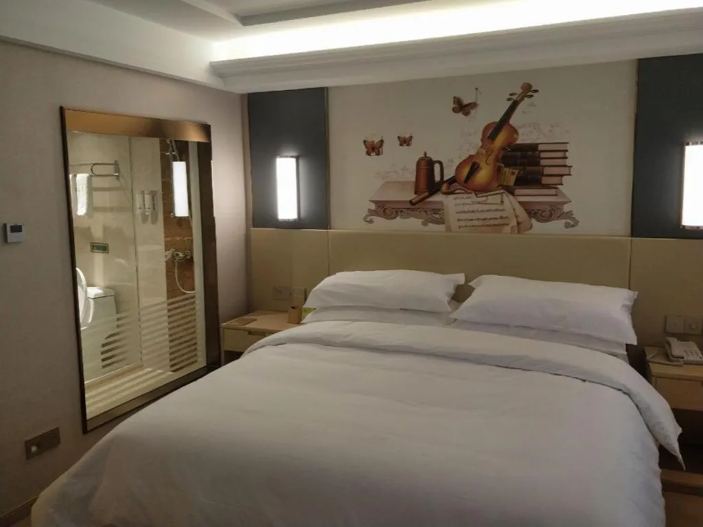 Bed in Vienna Hotel Yunnan Lijiang Ancient City