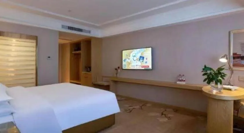 Bed in Vienna Hotel Yunnan Lijiang Ancient City