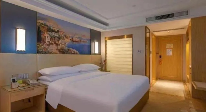 Bed in Vienna Hotel Yunnan Lijiang Ancient City