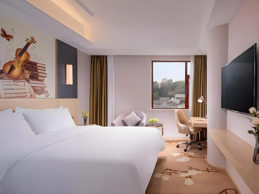 Bed in Vienna Hotel Yunnan Lijiang Ancient City