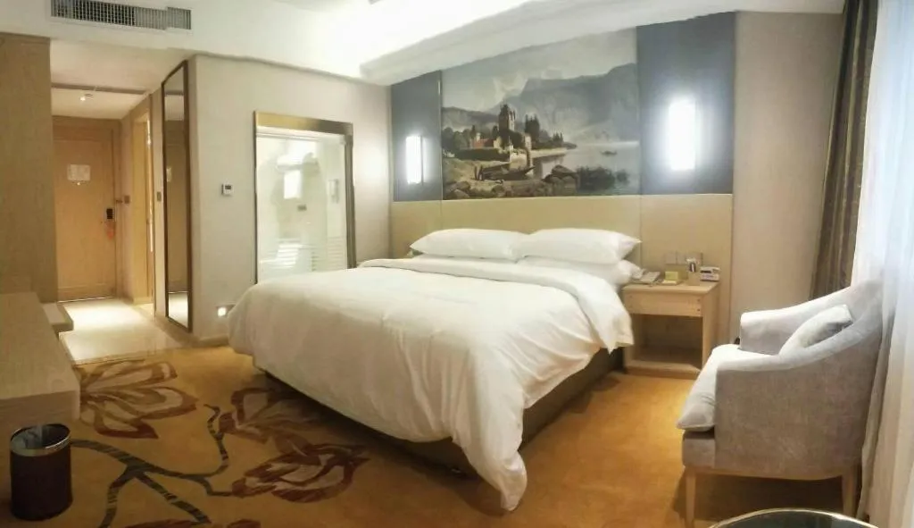 Bed in Vienna Hotel Yunnan Lijiang Ancient City