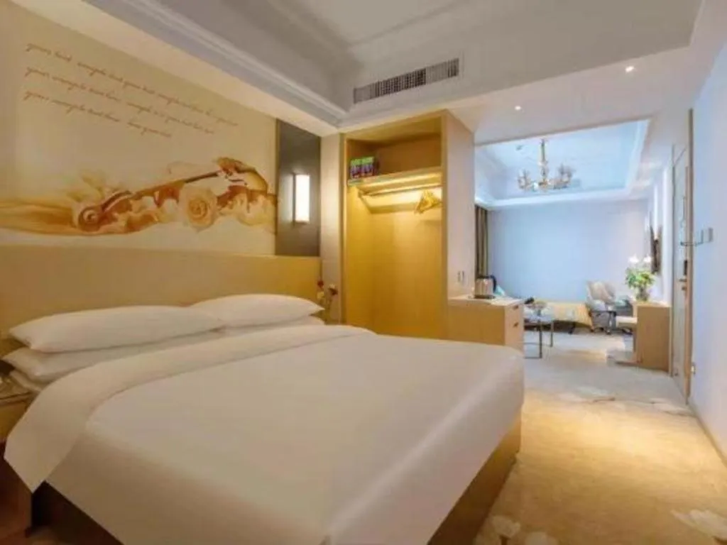 Bed in Vienna Hotel Yunnan Lijiang Ancient City