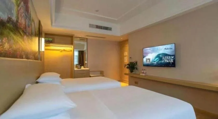 Bed in Vienna Hotel Yunnan Lijiang Ancient City