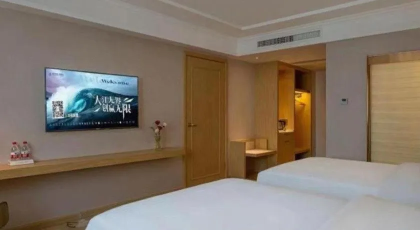 Bed in Vienna Hotel Yunnan Lijiang Ancient City