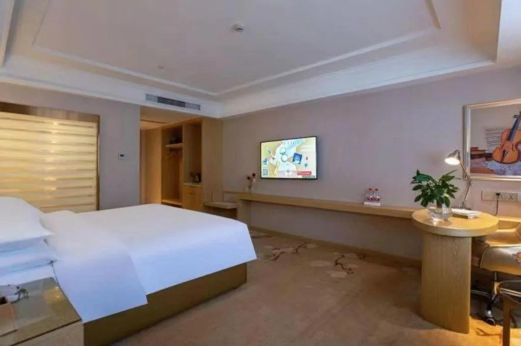 Bed in Vienna Hotel Yunnan Lijiang Ancient City