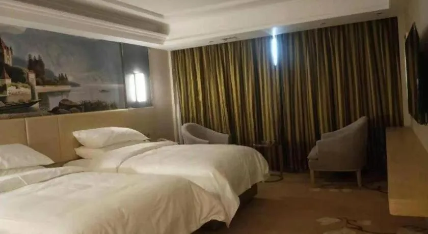 Bed in Vienna Hotel Yunnan Lijiang Ancient City