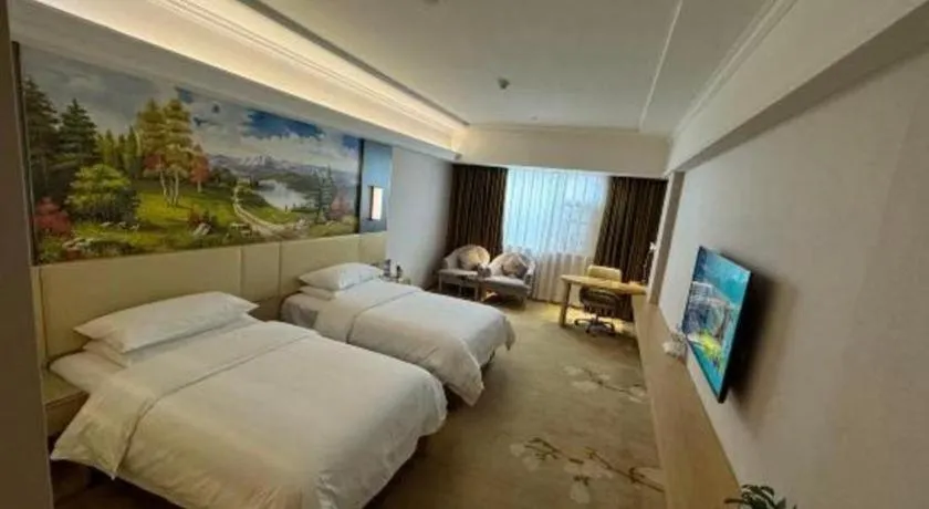 Bed in Vienna Hotel Yunnan Lijiang Ancient City