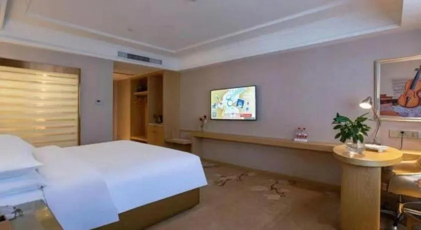 Bed in Vienna Hotel Yunnan Lijiang Ancient City