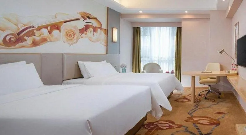 Bed in Vienna Hotel Yunnan Lijiang Ancient City